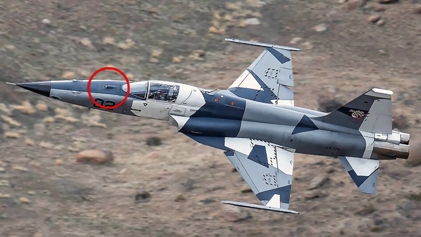 A picture Tactical Air Support released in October of its F-5AT jets fitted with the TacIRST sensor in the nose, which is highlighted in the red circle. <em>TacAir</em>