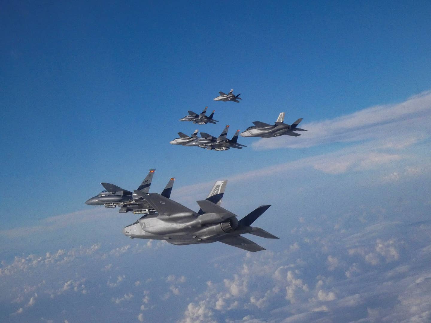 U.S. Air Force F-15Es and Israeli Air Force F-35Is in formation as part of the bilateral exercise in the U.S. Central Command area of responsibility, November 29, 2022. <em>U.S. Air Force courtesy photo</em>