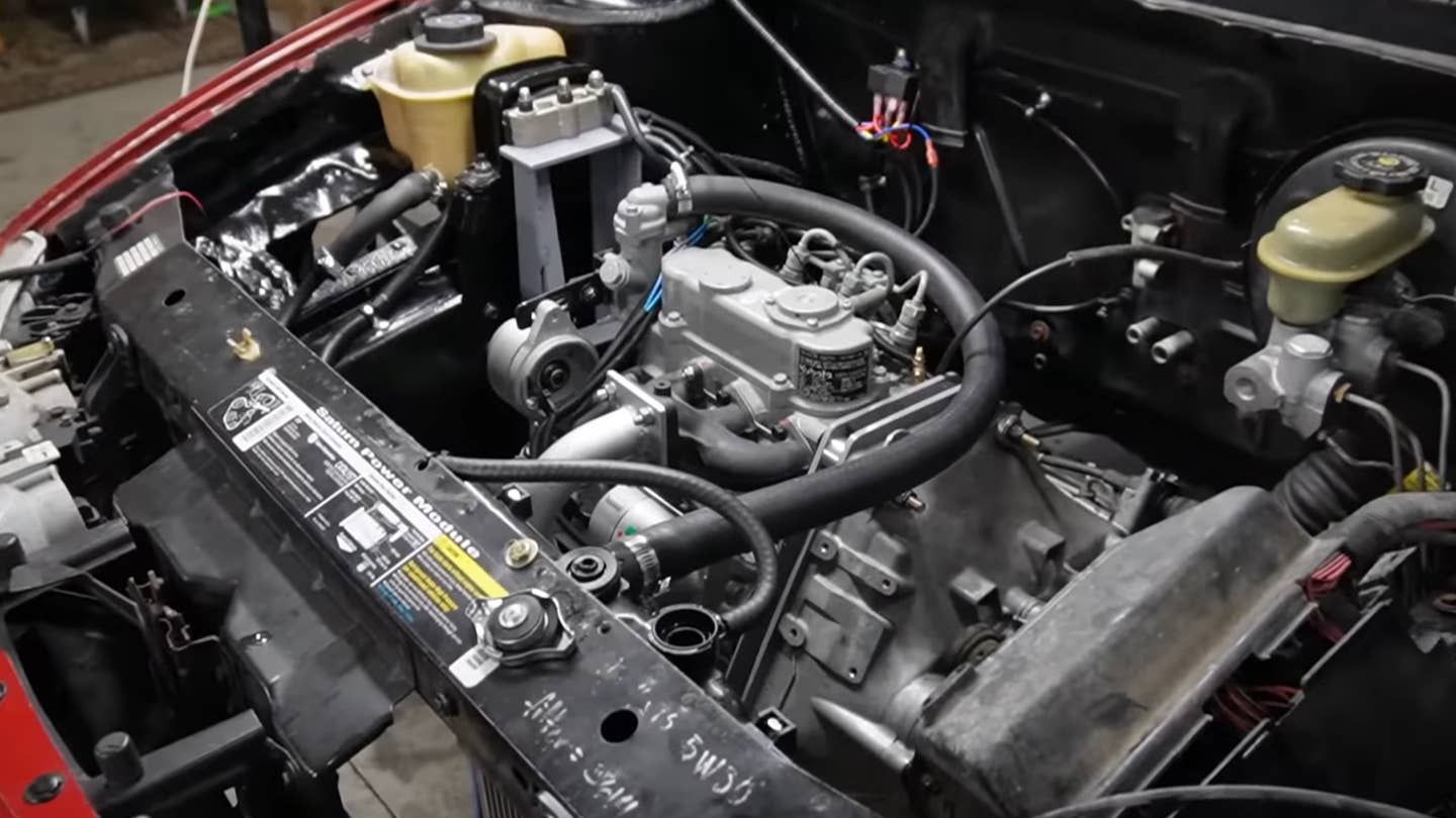Watch This Kubota Diesel-Swapped Saturn SC1 Hit Its Painfully Slow Top Speed