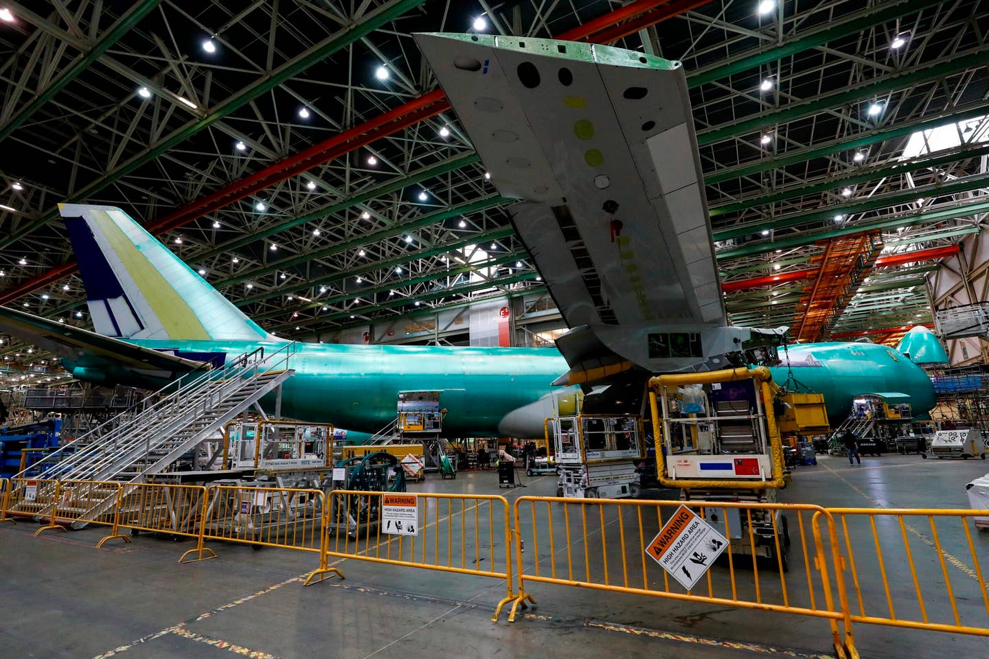 Workers assemble the third to last Boeing 747 aircraft at Boeing's Everett Production Facility Wednesday, June 15, 2022 in Everett, Wash. (Jennifer Buchanan/The Seattle Times via AP, Pool)