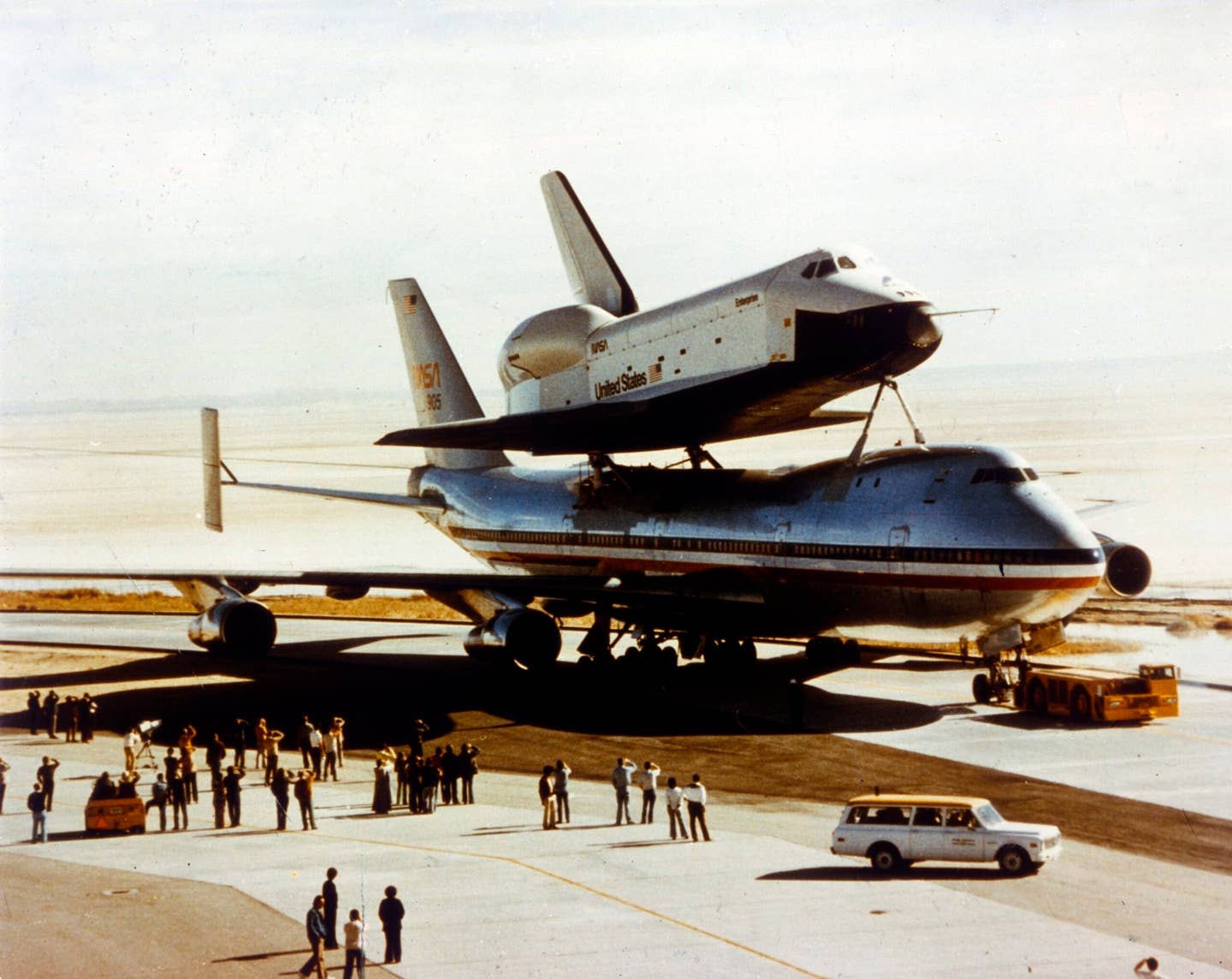 Roll-out of Space Shuttle Orbiter 'Enterprise', California, USA, 17 September 1976. The 'Enterprise' (OV-101) was built as part of NASA's Space Shuttle programme to perform atmospheric test flights after being launched from a modified Boeing 747 aircraft. OV-101, the first Space Shuttle orbiter, was built at the Palmdale manufacturing facilities in California. It was named the 'Enterprise' after the famous command of Captain James T Kirk, following a campaign by "Star Trek" fans. Its last flight was in 2012. Artist NASA. (Photo by Heritage Space/Heritage Images/Getty Images)