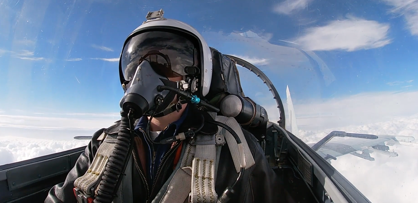 A screencap of the combat air patrol from the <em>Zvezda TV</em> video. Note that the pilot is not equipped with a helmet-mounted sight. <em>Zvezda TV</em> <em>screencap</em>
