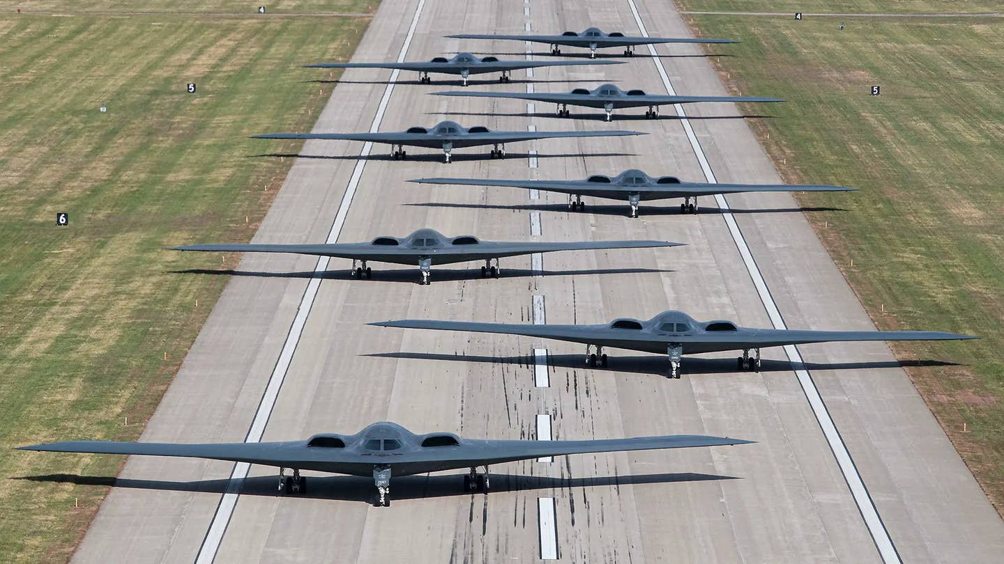 B-2s seen gathering on Whiteman AFB's single runway during an 'elephant walk' readiness exercise just a few weeks ago. <em>U.S. Air Force photo by Airman 1st Class Bryson Britt</em>