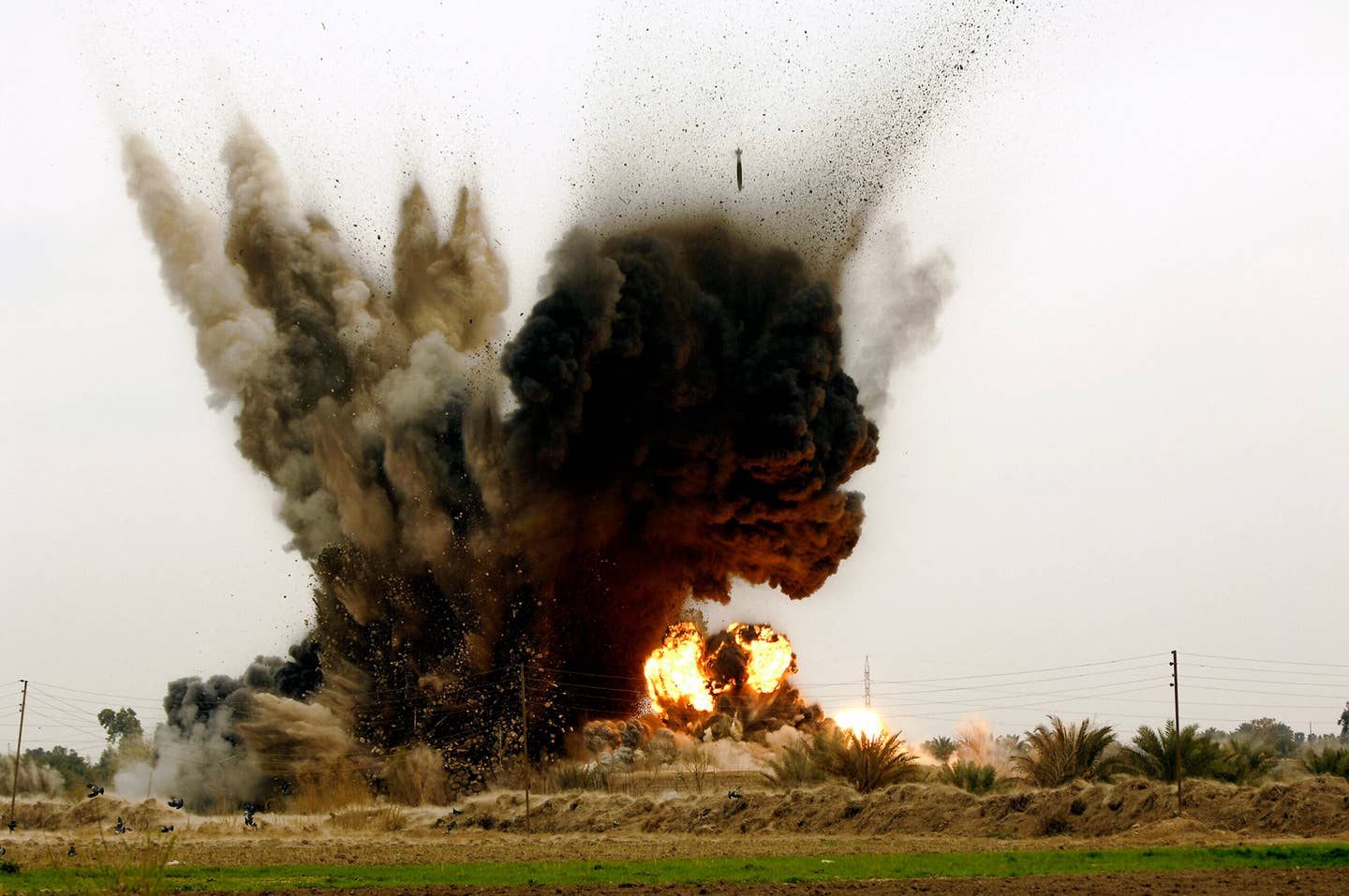An Al Qaeda torture compound and prison is destroyed after being hit with six 500-pound GBU-38 Joint Direct Attack Munitions dropped from a B-1B Lancer bomber over Iraq. <em>U.S. Air Force photo/Master Sgt. Andy Dunaway</em>