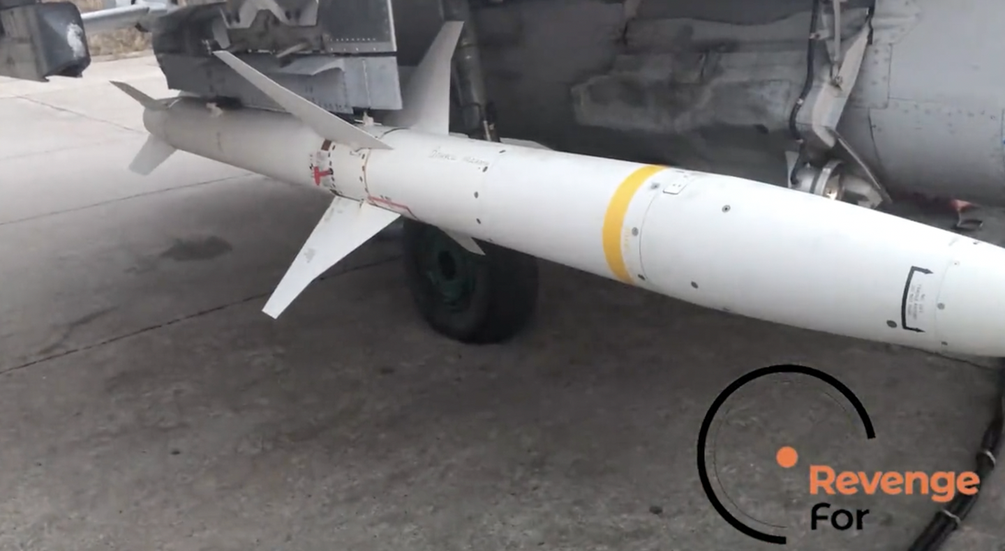 A screenshot from a video from the RevengeFor fundraising project showing an AGM-88 fitted to the MiG-29’s inner weapons station via a special pylon that the HARM’s LAU-118 adapter pylon is attached to.&nbsp;<em>Credit: RevengeFor via Twitter</em>
