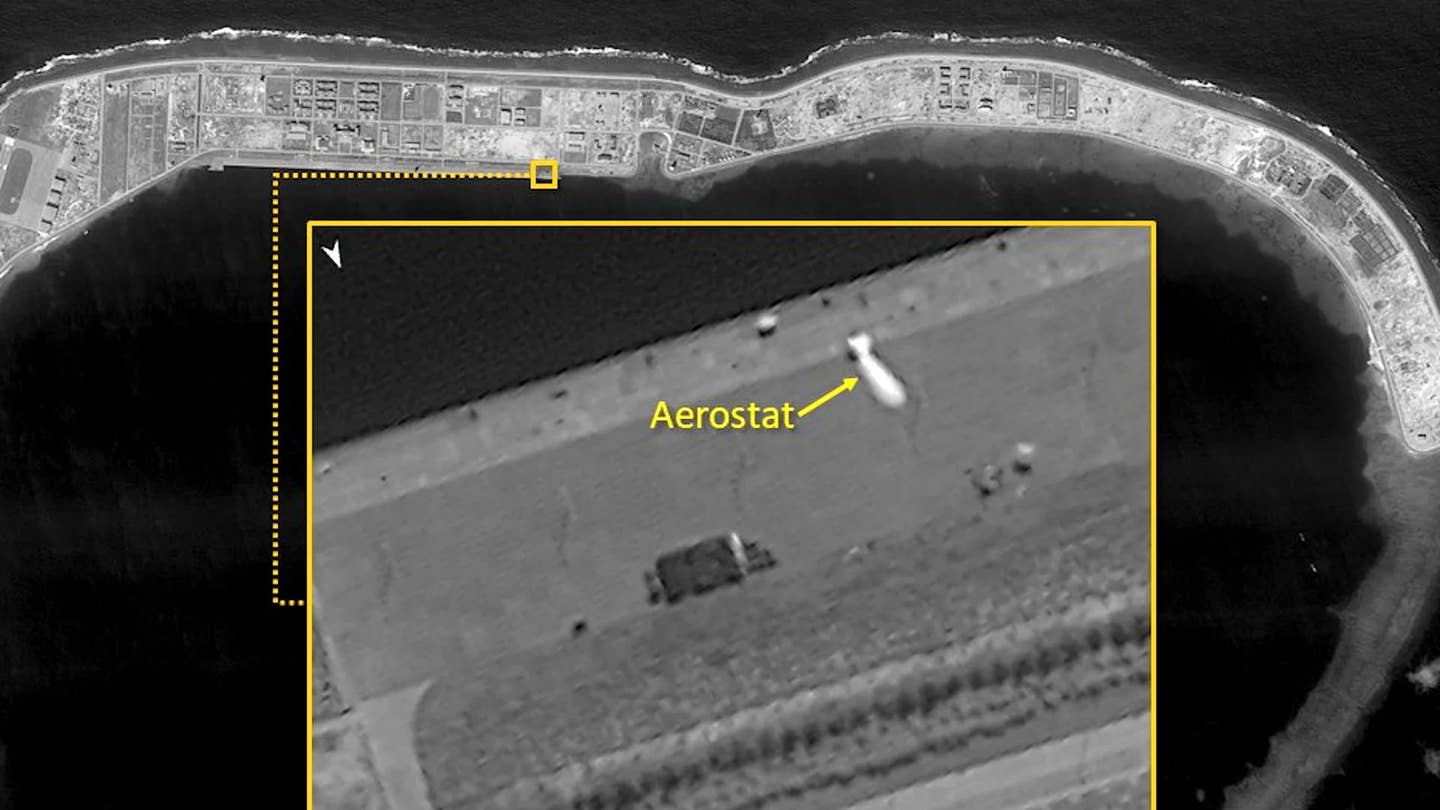 A satellite image showing a tethered aerostat at the Chinese base at Mischief Reef in the Spratly Islands in the South China Sea in 2019. <em>ImageSat International</em><br>