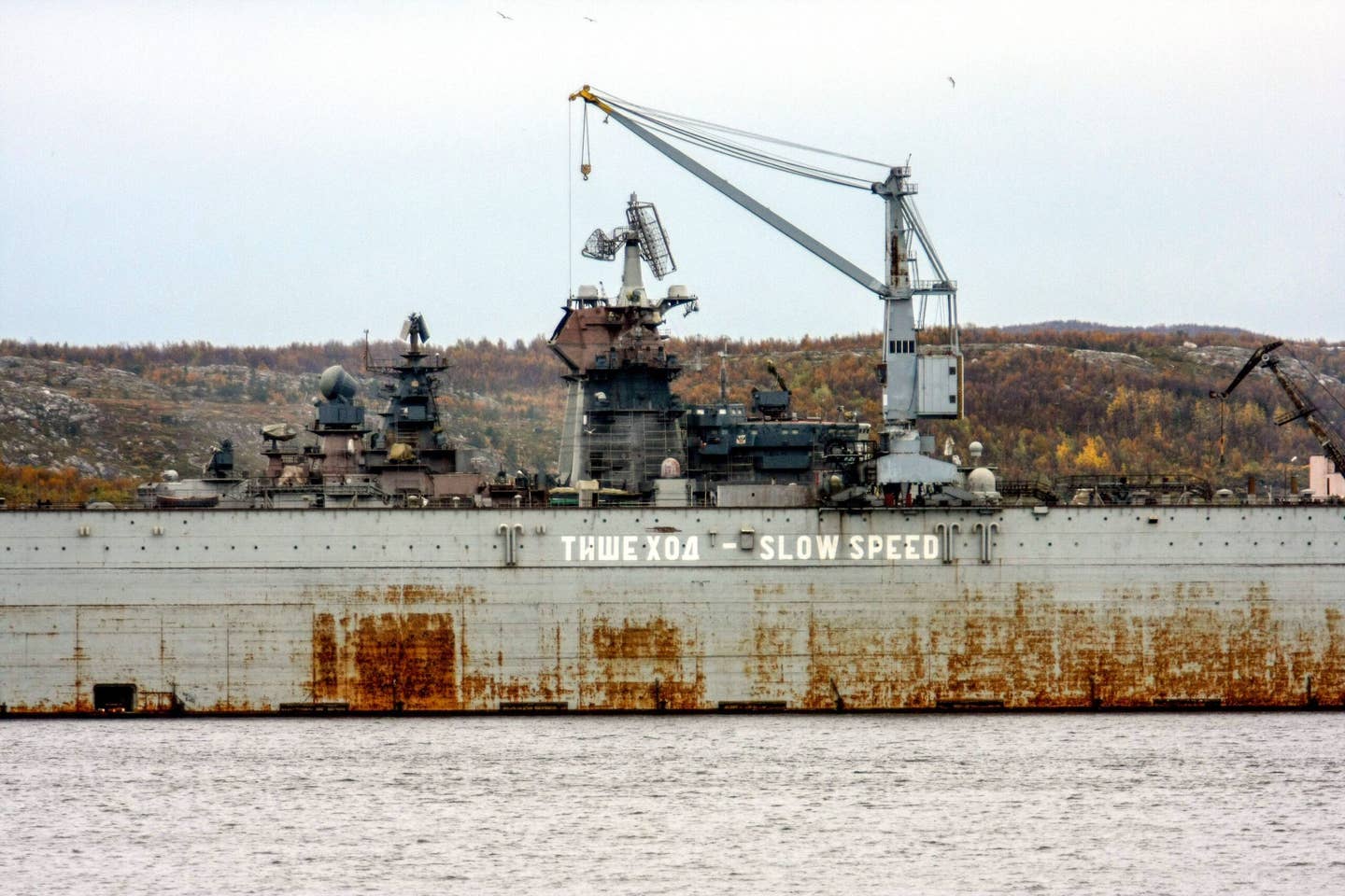 A picture taken on September 16, 2009, showing the PD-50 floating dock in Roslyakovo outside Murmansk. At this point, it was accommodating a <em>Kirov</em> class battlecruiser. <em>VASILY MAXIMOV/AFP via Getty Images</em>