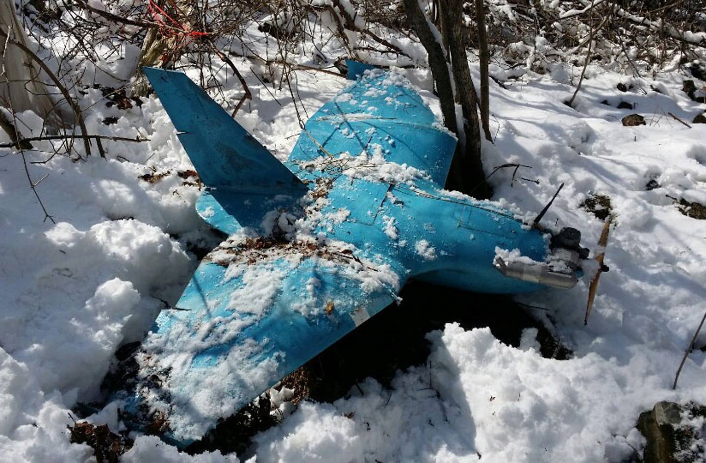 In this handout image provided by the South Korean Defense Ministry, the wreckage of a crashed drone is seen on a mountain on April 6, 2014, in Samcheok, South Korea. Three drones, believed to be North Korean, have been found in South Korea in recent weeks. (Photo by Handout/South Korean Defense Ministry via Getty Images)