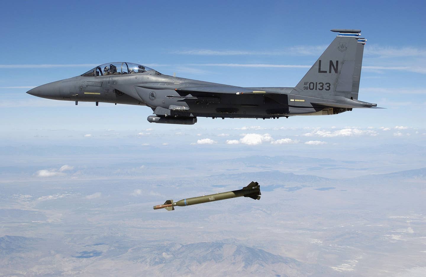 A U.S. Air Force F-15E Strike Eagle releases a GBU-28/B ‘bunker buster’ over the Utah Test and Training Range during a weapons evaluation test. <em>U.S. Air Force</em>