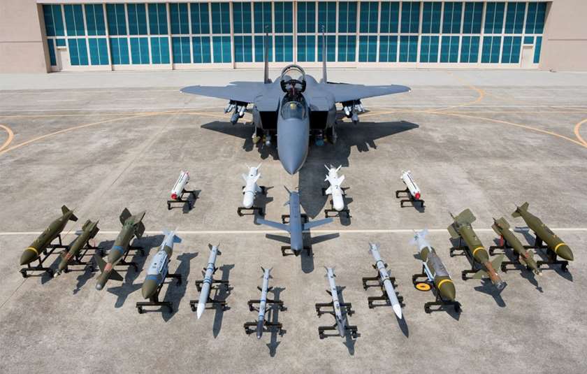 An F-15K with its impressive array of weapons options arranged in front of it. <em>ROKAF</em>