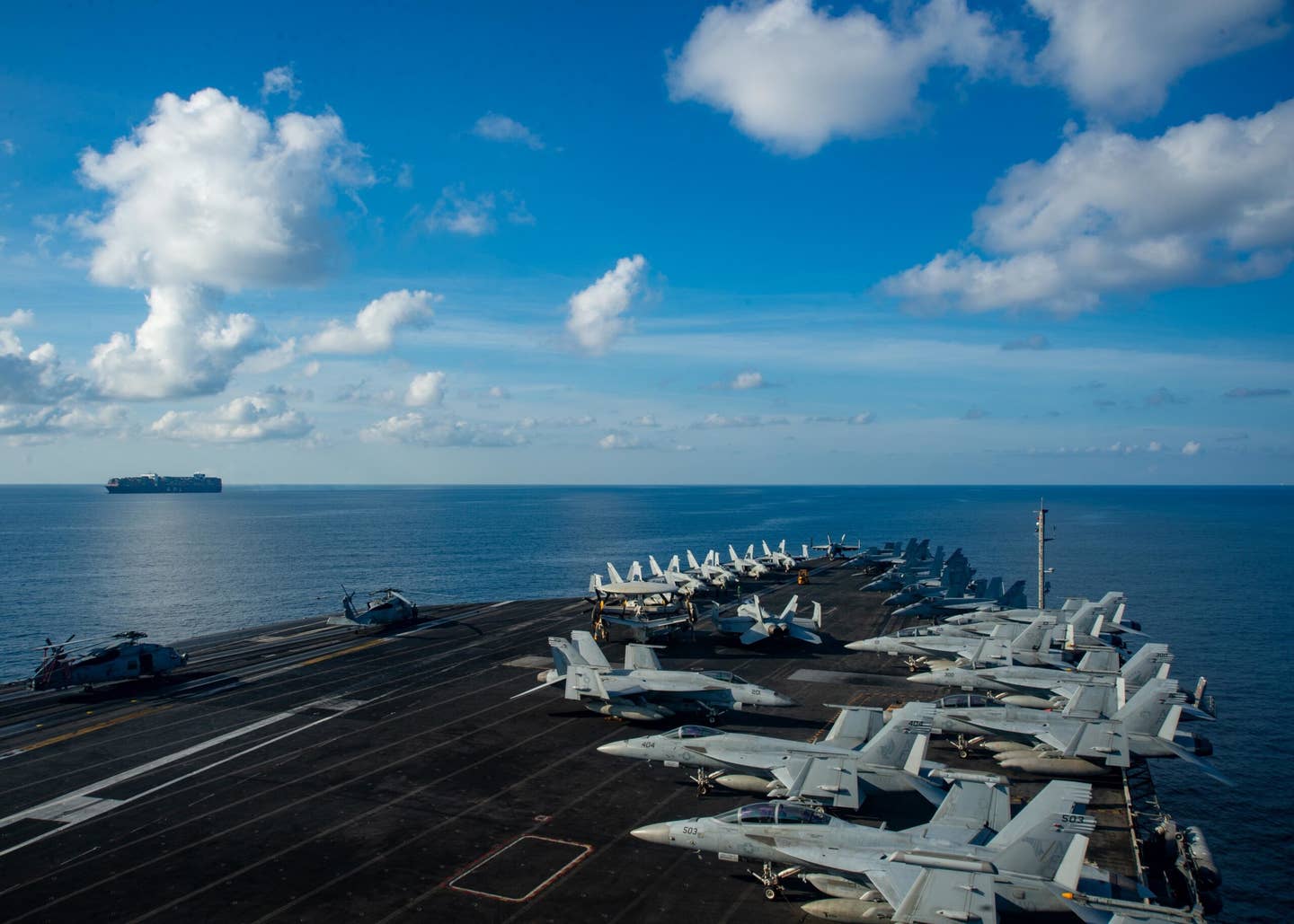 The U.S. Navy’s only forward-deployed aircraft carrier, USS <em>Ronald Reagan</em>, steams through international waters in the South China Sea in September 2021. <em>U.S. Navy photo by Mass Communication Specialist 3rd Class Askia Collins</em>