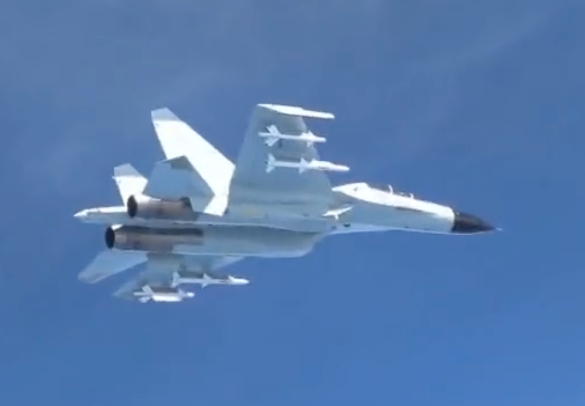A still from USINDOPACOM's video, showing the missiles underneath the Chinese J-11.<em> Credit: USINDOPACOM </em>