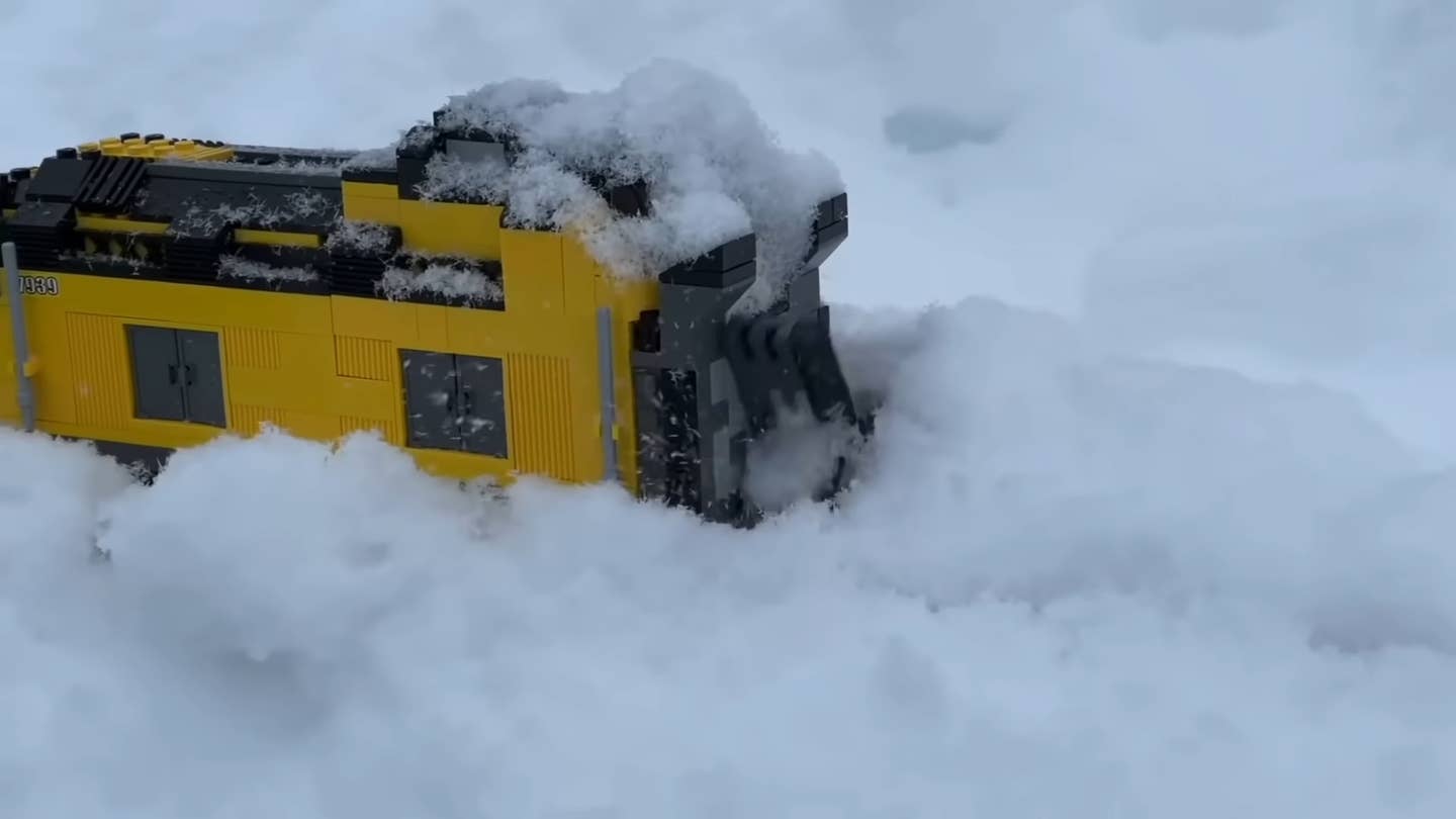 The plow train is capable of dealing with snow up to half of its own height. <em>YouTube/Brickcrafts</em>