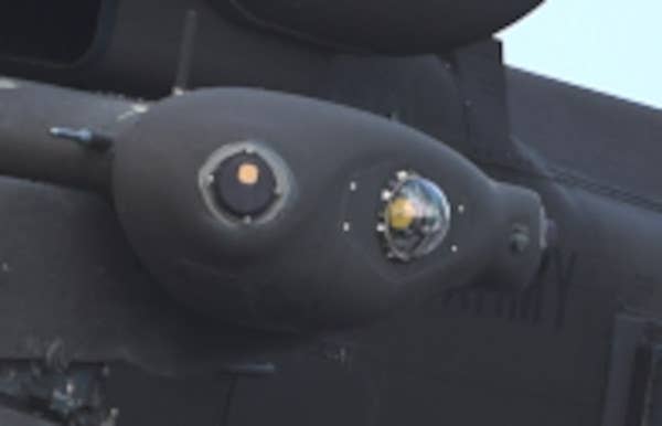 A close-up of one of the sponsons on an Apache fitted with the CIRCM system. <em>Army National Guard</em>