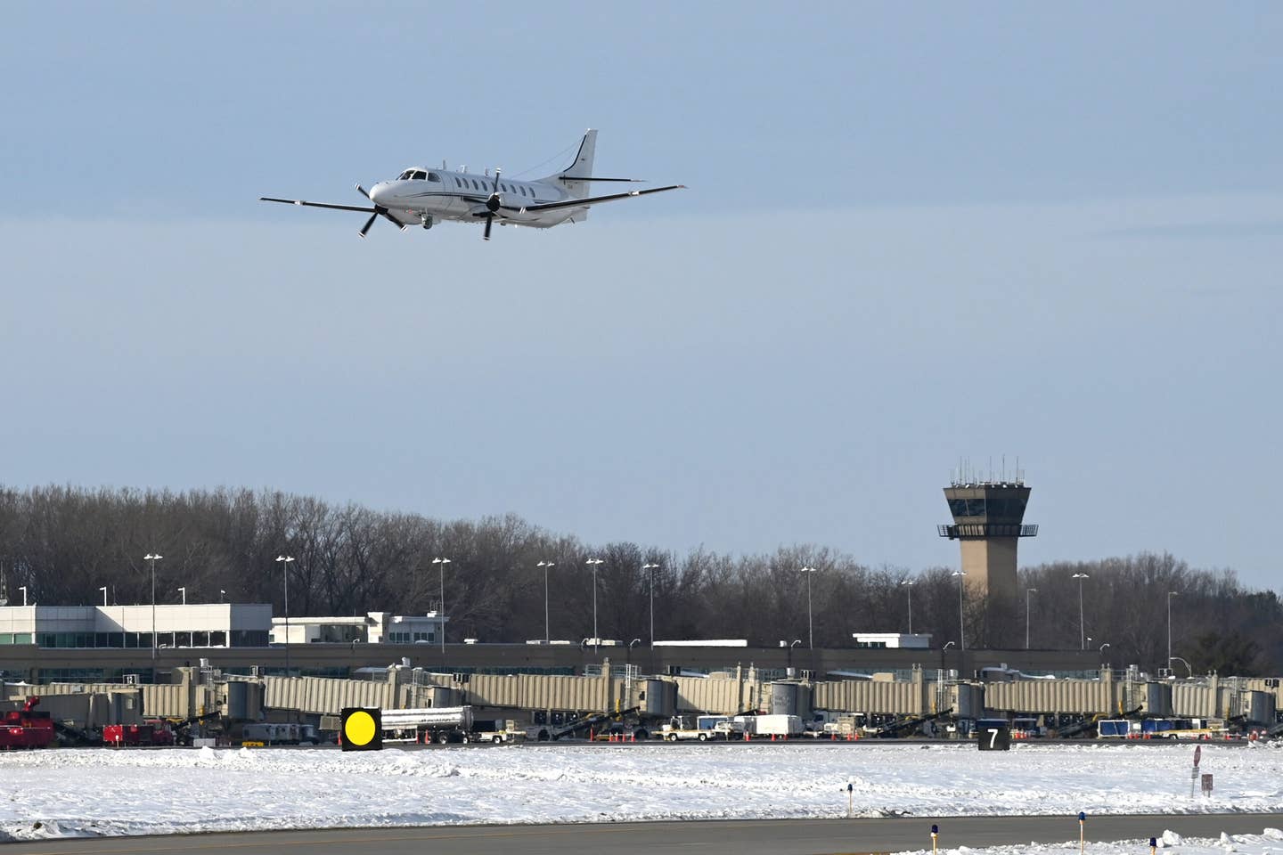 The Wisconsin Air National Guard’s RC-26B makes a final pass over Dane County Regional Airport in Madison, Wisconsin, on December 28, 2022. <em>U.S. Air National Guard photo by Senior Master Sgt. Paul Gorman</em>