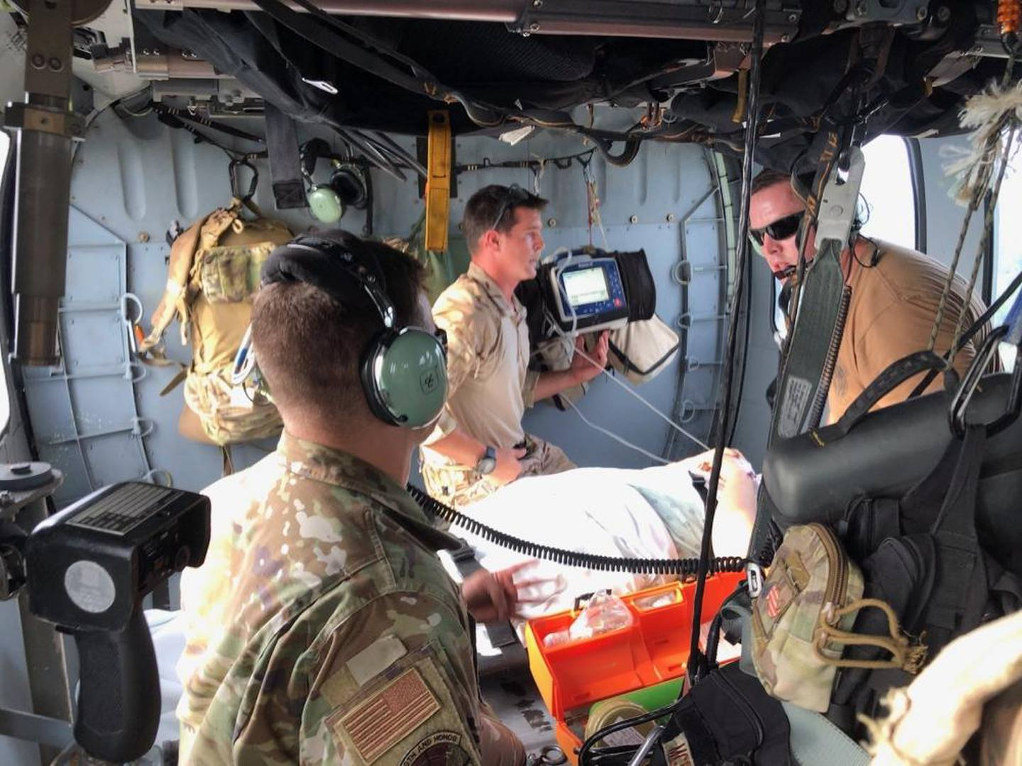 Airmen from the 38th Rescue Squadron transport a patient during the HH-60W Jolly Green II’s first official rescue mission in Tampa, Florida, Sept. 7. <em>Credit: Senior Airman John Crampton/U.S. Air Force</em>
