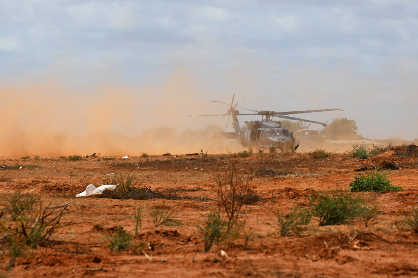 An HH-60W combat rescue helicopter lands in support of a CASEVAC exercise at an undisclosed Combined Joint Task Force-Horn of Africa area of responsibility, Dec 8, 2022. <em>Credit: U.S. Air Force photo by Tech. Sgt. Jayson Burns</em>