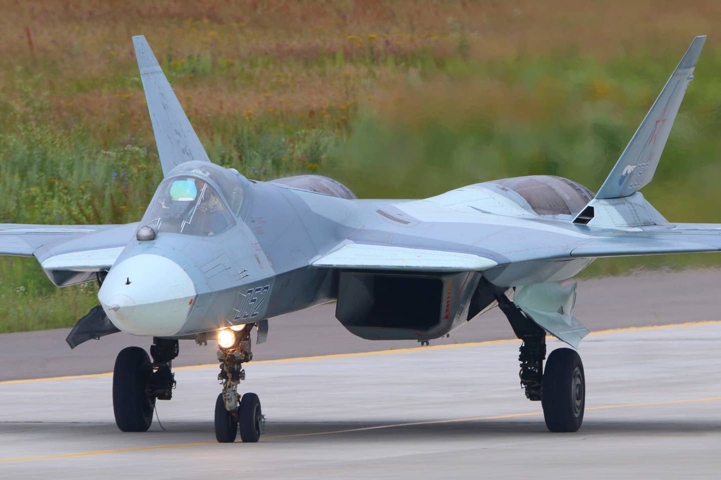 The second flyable prototype Su-57 (then still known as the T-50), or T-50-2, in March 2011. This aircraft has since been fitted with a single example of the new-generation izdeliye 30 engine, for tests. <em>Getty Images</em>