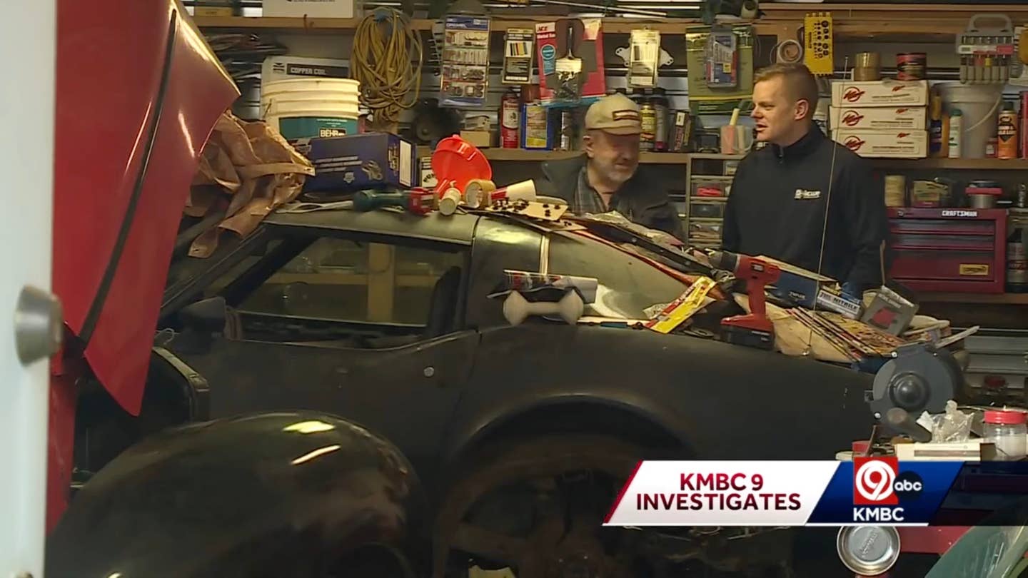 A C3 Chevy Corvette owner and newscaster stand behind a parts car in Kansas