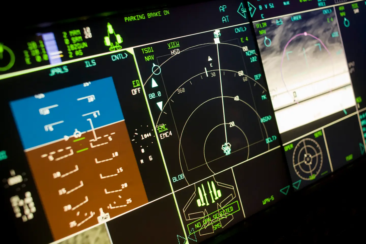 Glowing cockpit instrumentation of a Lockheed Martin F-35 Lightning II stealth fighter.&nbsp;<em>Credit: Photo by In Pictures Ltd./Corbis via Getty Images</em>