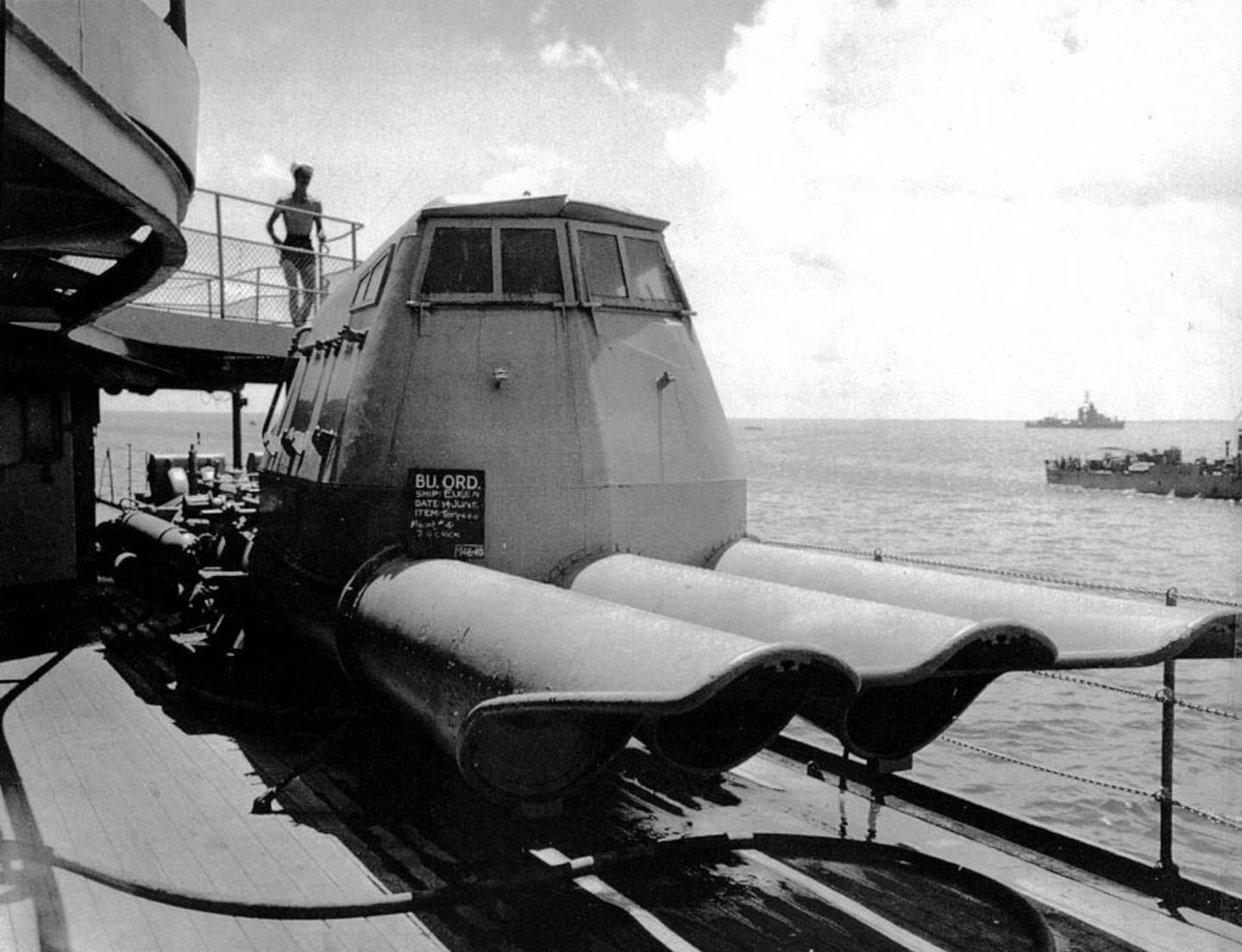 Front-facing view of number four mount. Just to the left of the mount, the shell and torpedo transfer rail system is located. <em>U.S. Navy photo</em>