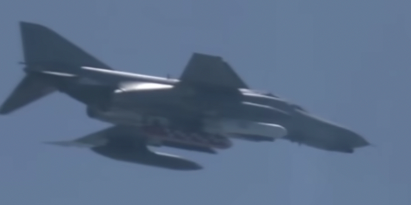 An air-launched cruise missile test round carried by a South Korean F-4E Phantom II fighter jet during trials. A weapon like this could potentially be adapted to carry a nuclear warhead. <em>YouTube Screencap</em>