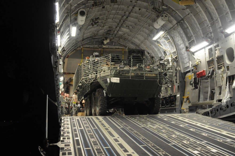 A C-17 Globemaster III can carry up to four Strykers. (Photo by Sgt. David Nunn)