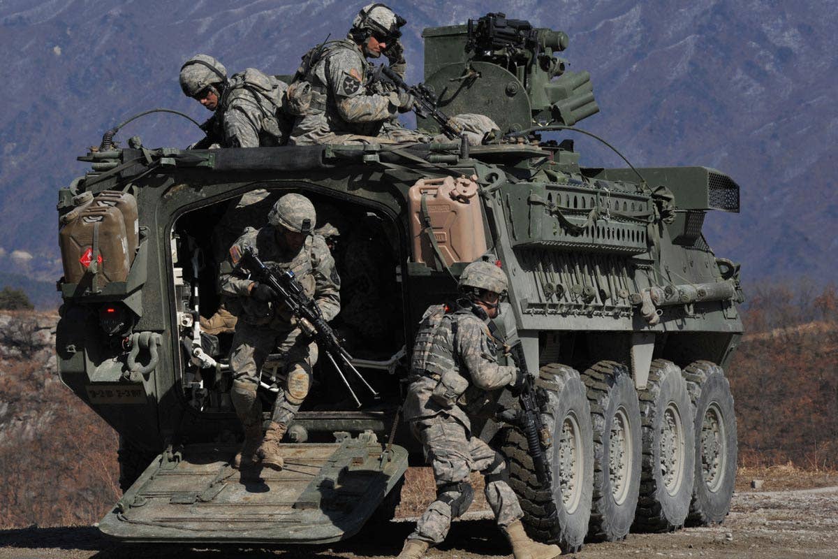 Troops dismount from a Stryker. (US Army)