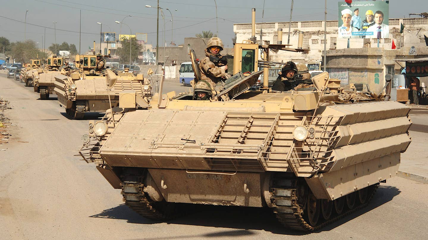 Up-armored FV432 Mk 3 Bulldogs in Iraq in 2007. <em>Crown Copyright</em>