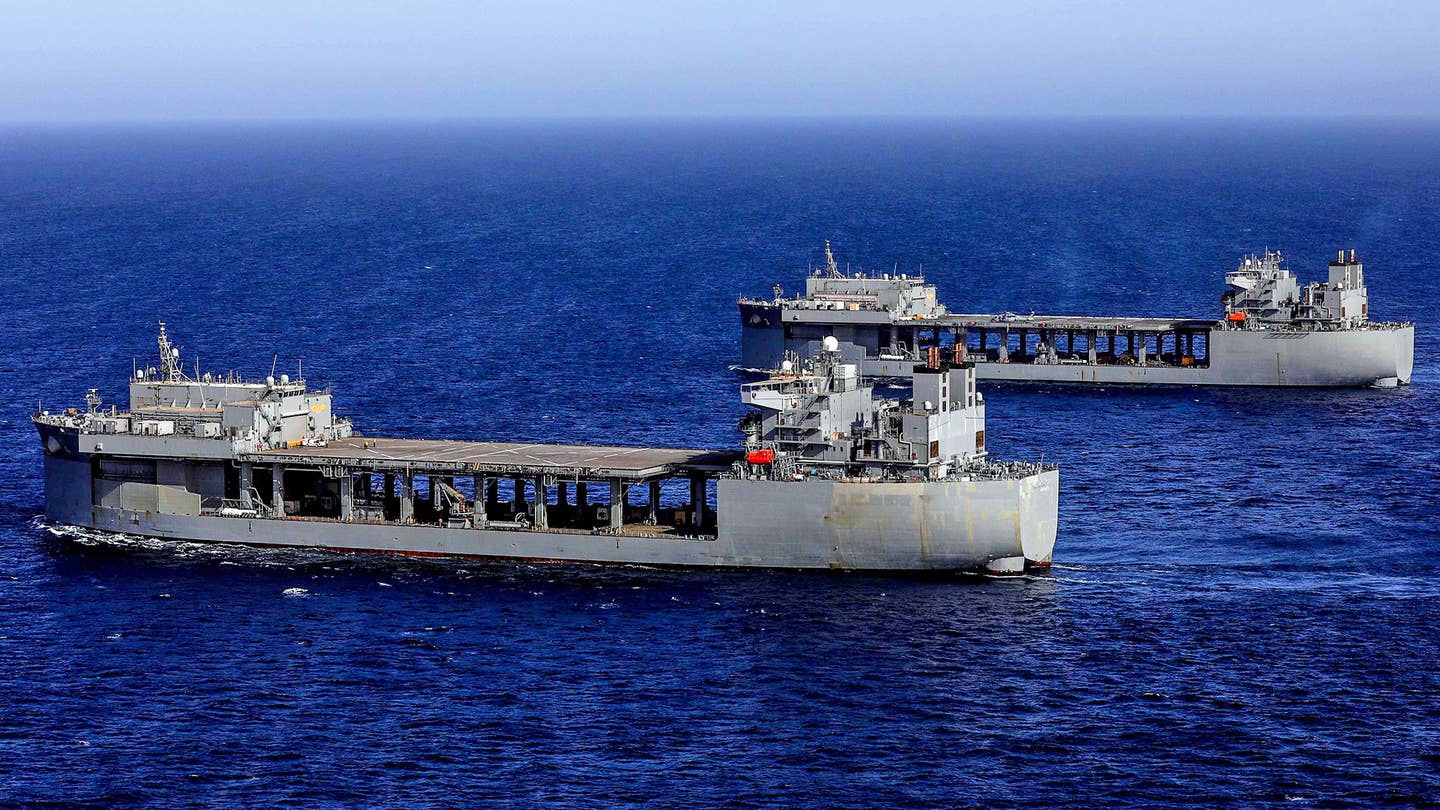 Expeditionary sea bases USS<em> Hershel “Woody” Williams</em> (ESB 4) and <em>USS Lewis B. Puller</em> (ESB 3) sail together in the Gulf of Aden. <em>Credit: U.S. Army Photo by Spc. Frederick Poirier</em>