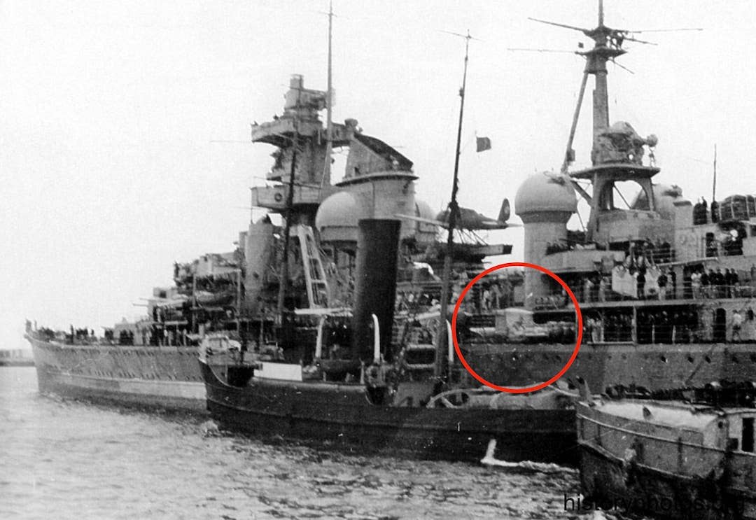 <em>Prinz Eugen</em> pictured in Brest, France, early 1941. One of the torpedo launchers, circled in red, appears to sport some form of covering, although this doesn't seem to resemble the permanent enclosures seen in later images. <em><a href="https://www.historyphotos.org/galleries/prinz-eugen-1941">Historical Photo Archive</a></em>