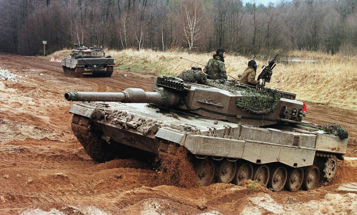 Dutch Leopard 2A4 tanks. Note the distinctly boxier turret compared to the newer 2A6 variant (also found on the 2A5, as well as newer versions). <em>Dutch Ministry of Defense</em>