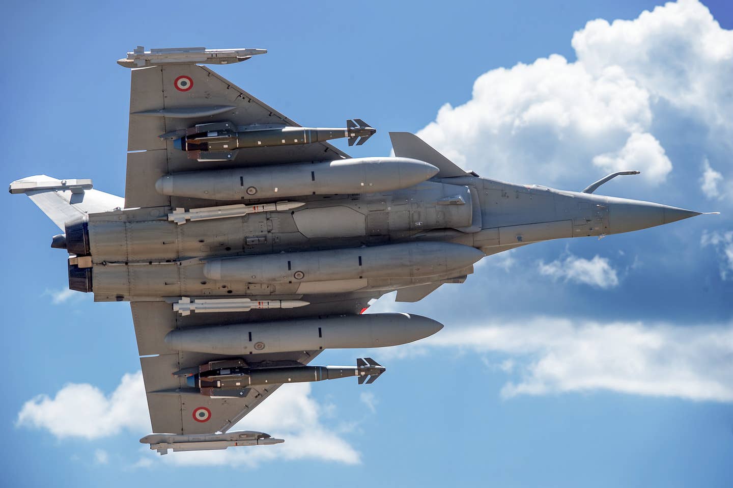 A French Rafale jet carrying a mixed air-to-air and air-to-ground weapons load. <em>Dassault Aviation</em>