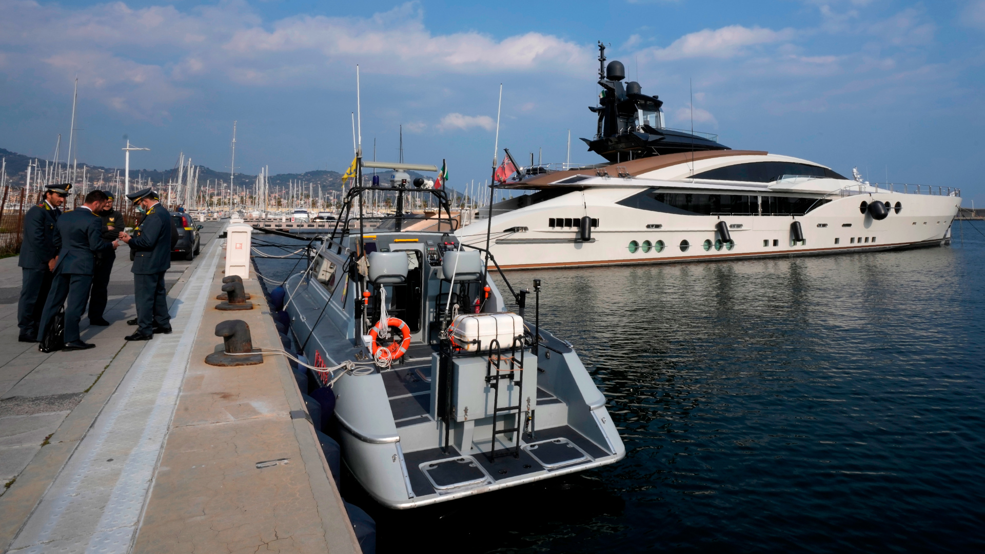 Italian Finance Police worked to seize assets belonging to multiple Russian billionaires, including "Lady M", a yacht owned by Russian oligarch Alexei Mordashov. AP Images