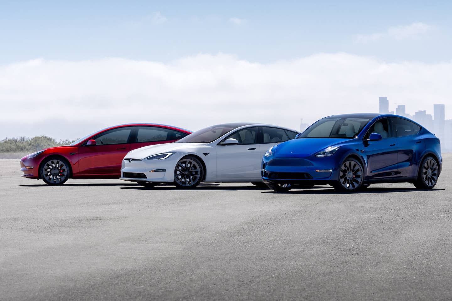 Tesla Model 3, S, and Y (left to right). <em>Tesla</em>
