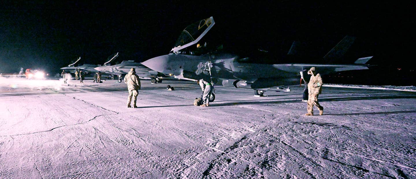 Pilots and ground crew prepare F-35As deployed to Thule Air Base, Greenland, to take off on sorties during Operation Noble Defender 23-2.1 on Jan. 16, 2023. <em>Department of Defense photo by Master Sgt. Benjamin Wiseman</em>