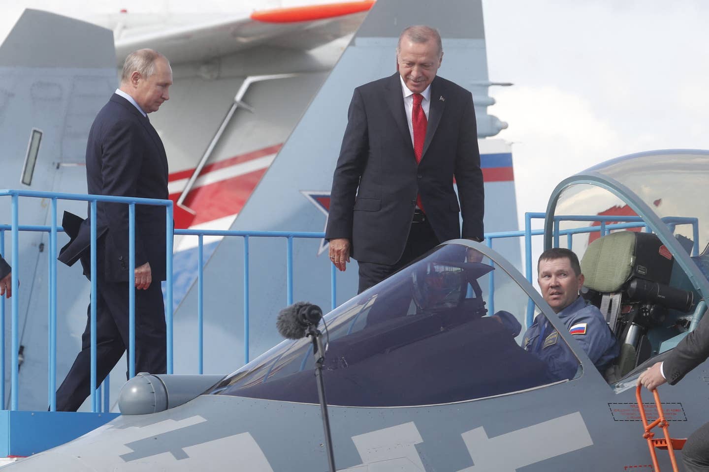 President Putin (left) and his Turkish counterpart Recep Tayyip Erdogan inspect a Su-57 during the MAKS 2019 International Aviation and Space Salon opening ceremony in Zhukovsky outside Moscow on August 27, 2019. <em>Photo by MAXIM SHIPENKOV/POOL/AFP via Getty Images</em>