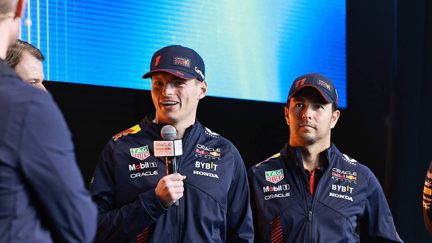 Red Bull drivers Max Verstappen and Sergio Perez discussing the upcoming 2023 season at Classic Car Club Manhattan on February 03, 2023 | Photo by Arturo Holmes/Getty Images for Oracle Red Bull Racing