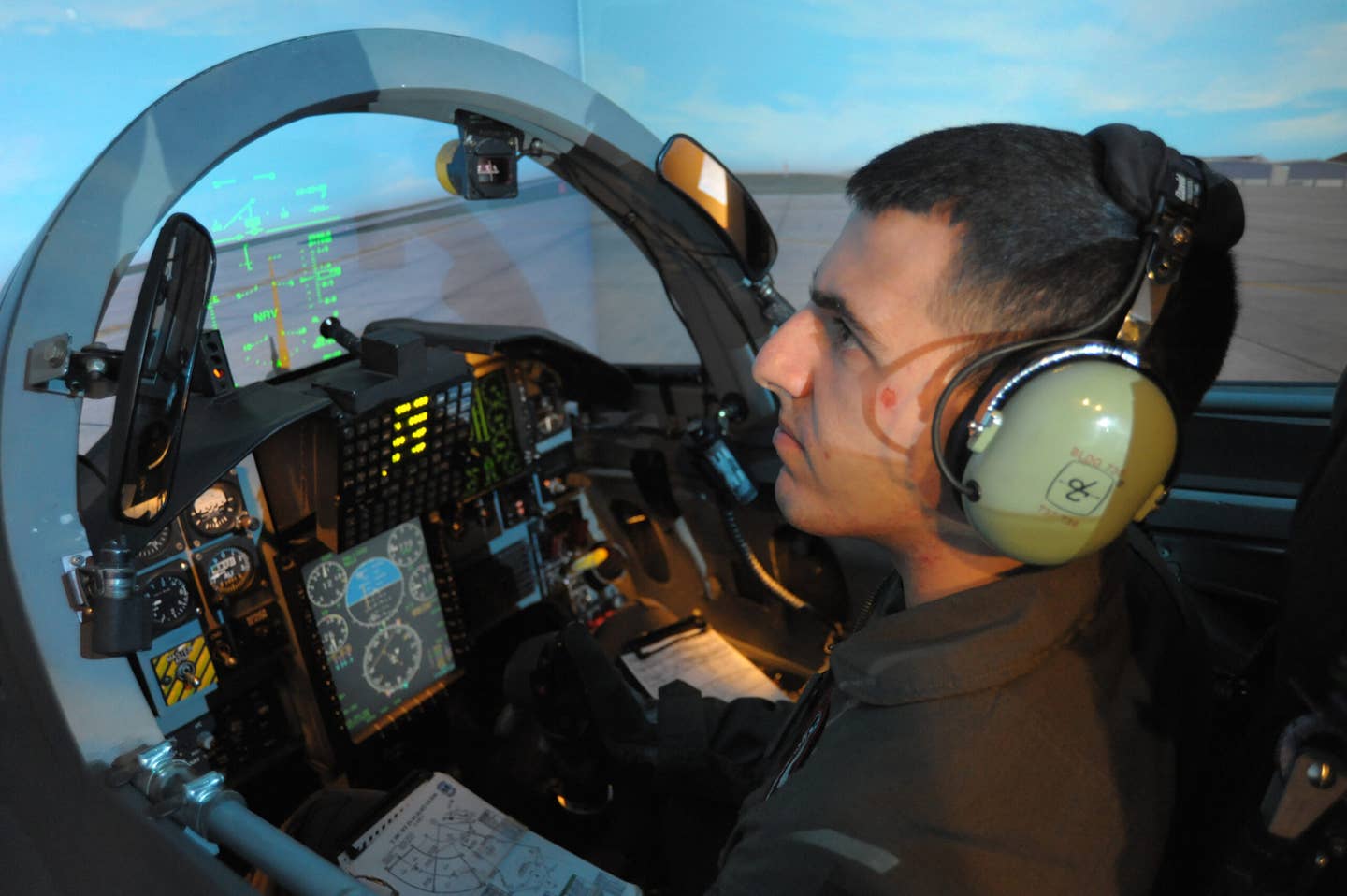 A U.S. Air Force student trains on a T-38 simulator at Joint Base San Antonio-Randolph, Texas. <em>U.S. Air Force photo by Joel Martinez/Released</em>
