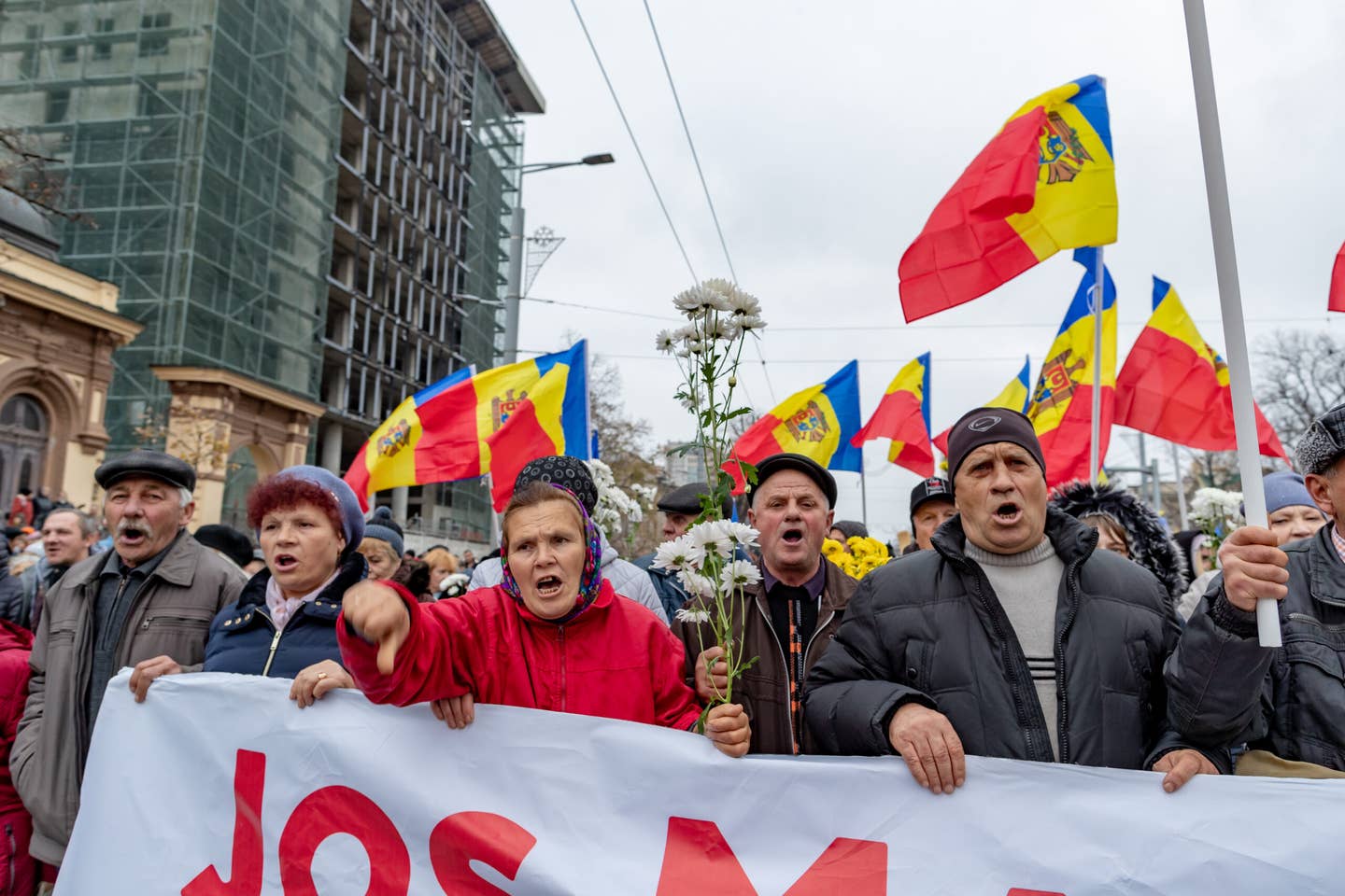 Protesters calling upon Moldova’s pro-Western leaders to leave the office during a march in the capital, Chisinau, on November 13, 2022. <em>Photo by Vudi Xhymshiti/Anadolu Agency via Getty Images</em>