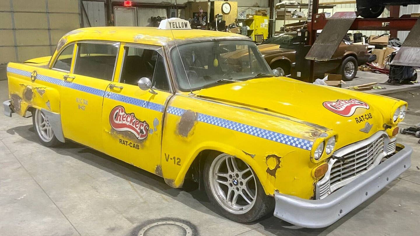 Make the Holy Grail of Bad Decisions and Buy This Checker Cab Body-Swapped V12 BMW 7-Series