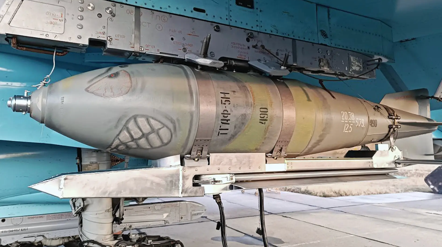 The Russian wing kit, based on a FAB-500M-62 bomb, seen here loaded onto a Su-34 Fullback strike aircraft. <em>via Telegram</em>