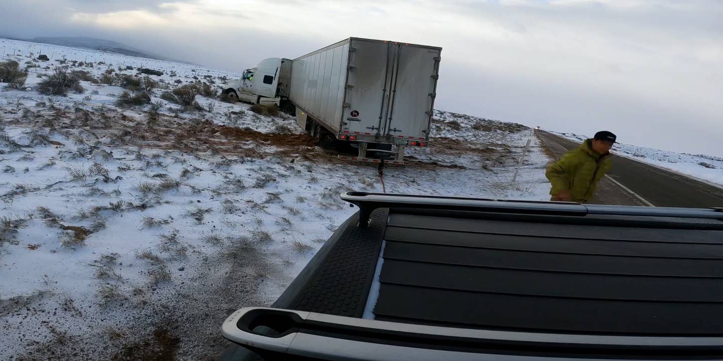 Rivian R1T Yanks 38,000-Pound Semi-Truck and Trailer Out of the Snow