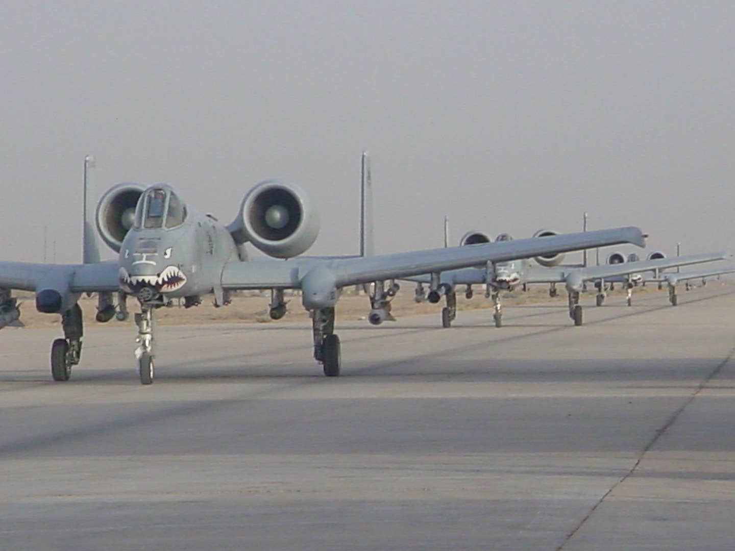 A flight of four A-10s from the 75th Expeditionary Fighter Squadron rolls out for a mission. <em>via Kim “KC” Campbell</em>