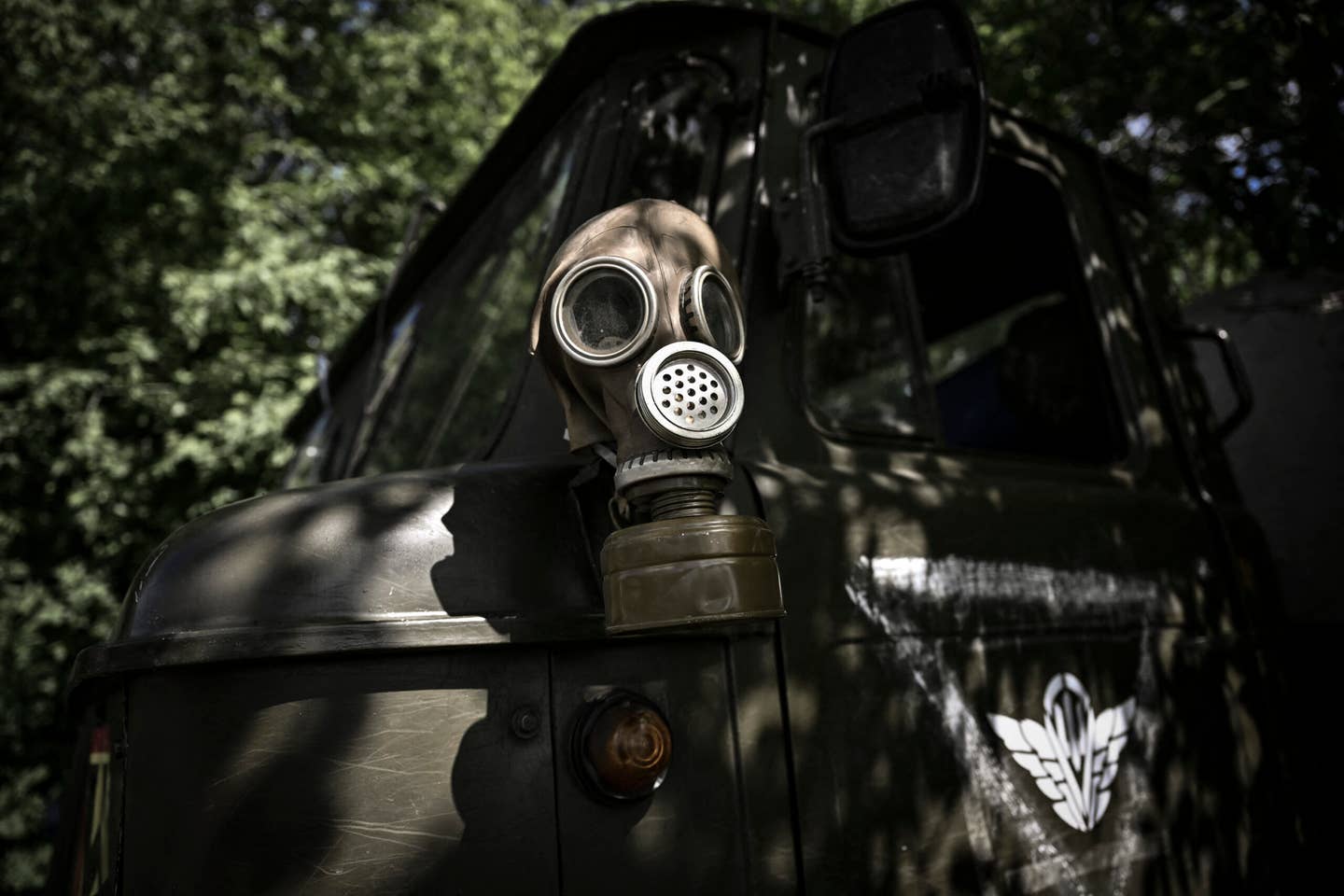 A Soviet-style respirator on a military vehicle at a checkpoint held by Ukrainian forces outside the city of Lysychansk in the eastern Ukrainian region of Donbas, in May 2022. <em>Photo by ARIS MESSINIS/AFP via Getty Images</em>