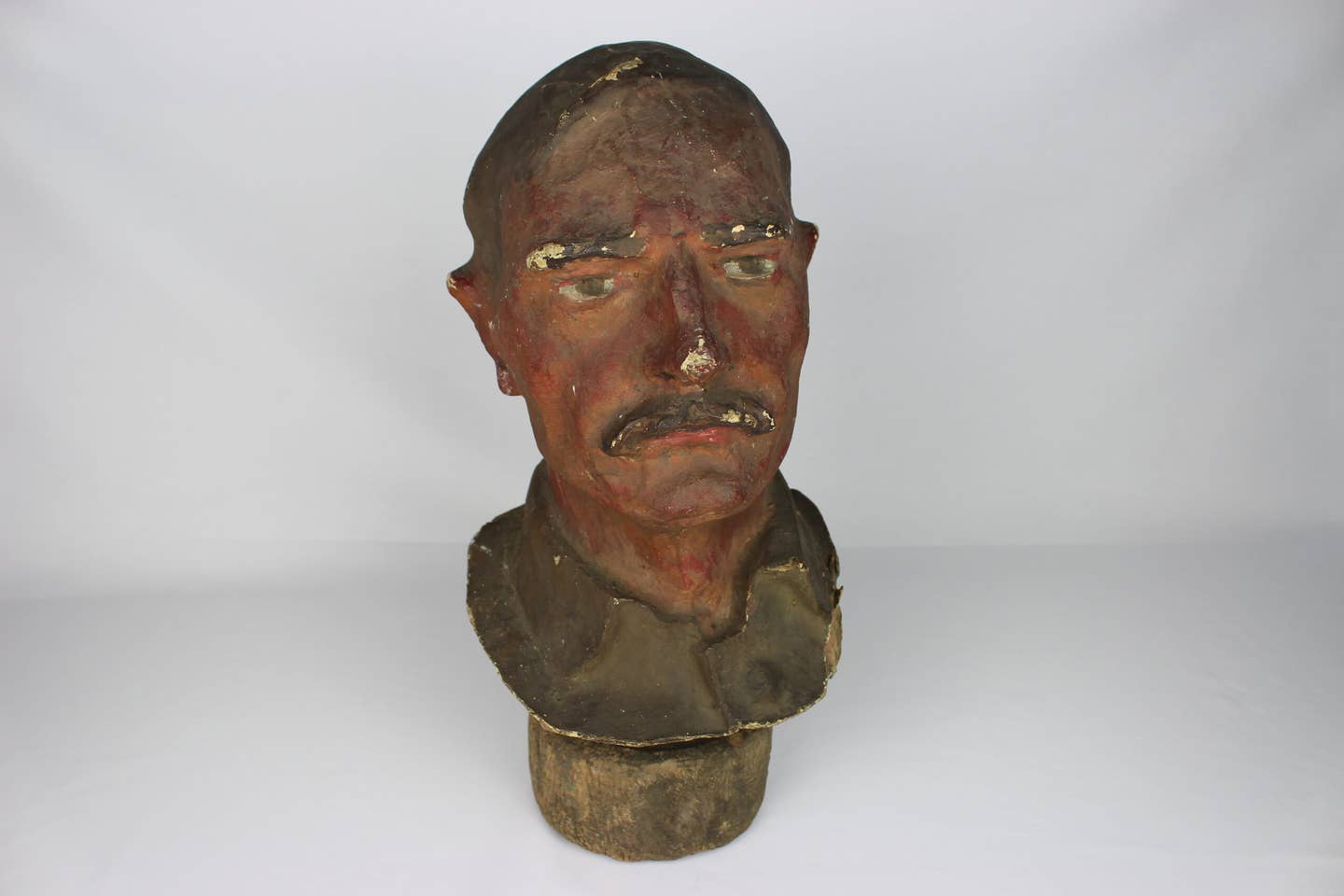 A World War One papier-mâché sniper decoy in the shape of a human head, apparently a British officer. <em>Courtesy of York Museums Trust</em><br>