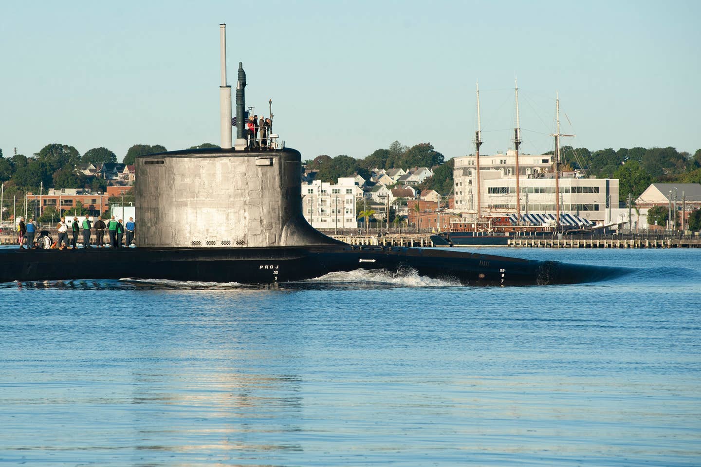 <em>USS Delaware</em> (SSN 791) makes its way up the Thames River and past the city of New London returning to Submarine Base New London on Friday, Oct. 1, 2021 after conducting routine operations. (U.S. Navy Photo by John Narewski/Released)