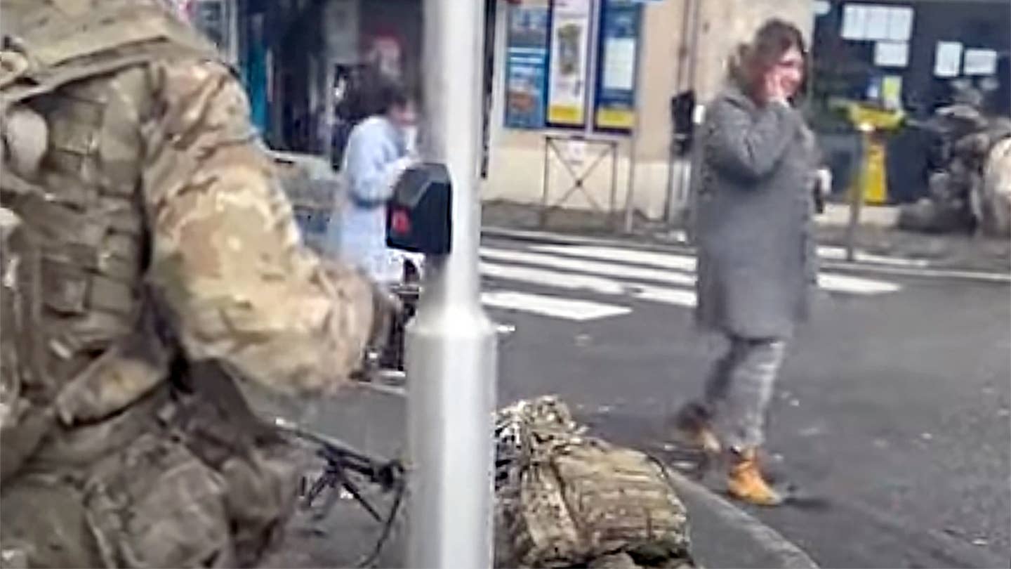 Watch People Just Go About Their Day As A Mock Battle Is Fought In French Streets