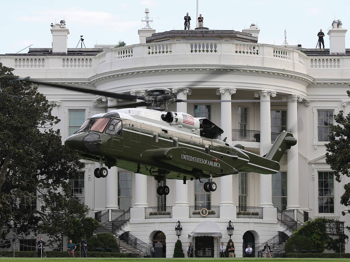 (Sept. 22, 2018) Marine Helicopter Squadron (HMX) 1 conducts test flights of the new VH-92A helicopter over the South Lawn of the White House, Sept. 22, 2018, in Washington, D.C. (U.S. Marine Corps photo by Sgt. Hunter Helis/Released)