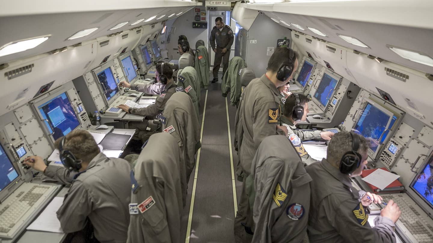 Turkish sensor operators aboard a Turkish Air Force E-7 Wedgetail airborne early warning and control jet. (Photo by Orhan Akkanat/Anadolu Agency/Getty Images)